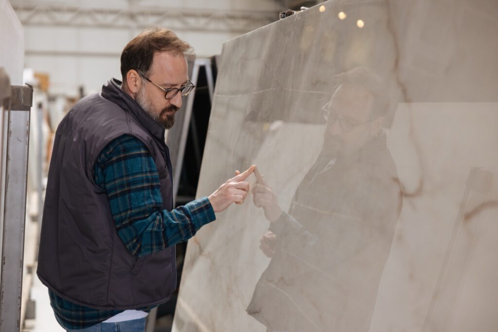 Man looking at granite